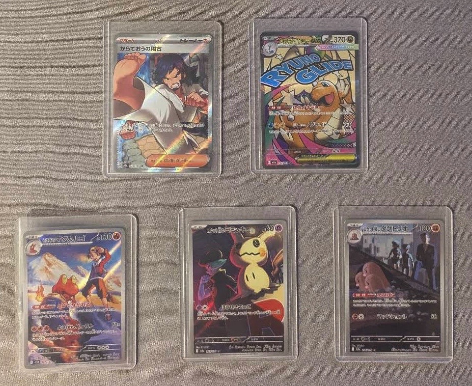 Reviewer's photo: two single cards pulled